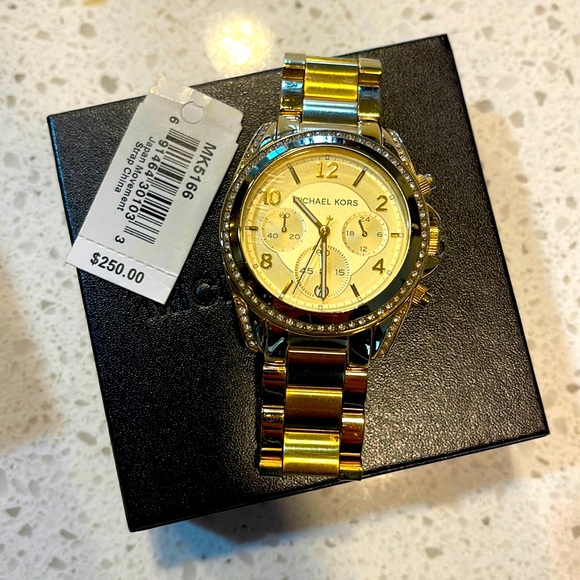 Gold MK watch